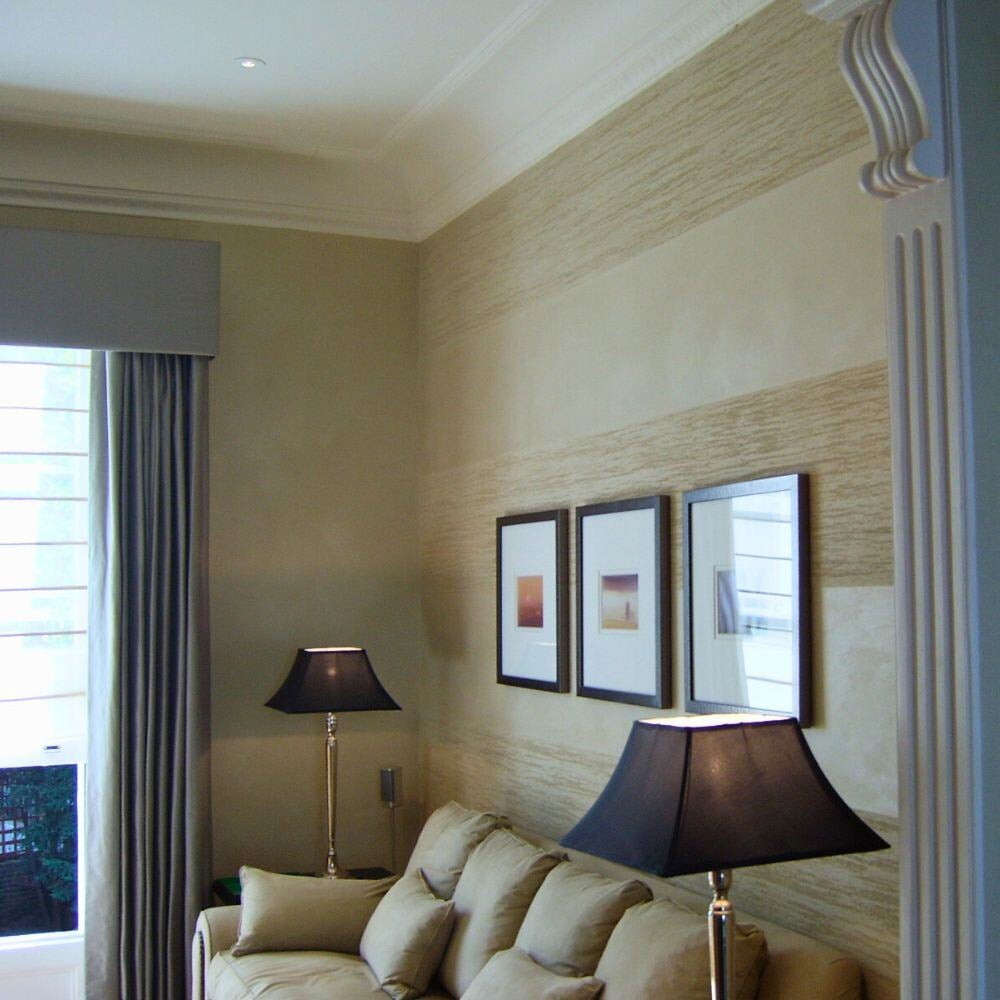 Elegant living room lighting with neutral tones and classic detailing at Walton Place.